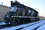 NS 5037 rits quietly after a collision with a grain car at the local elevator